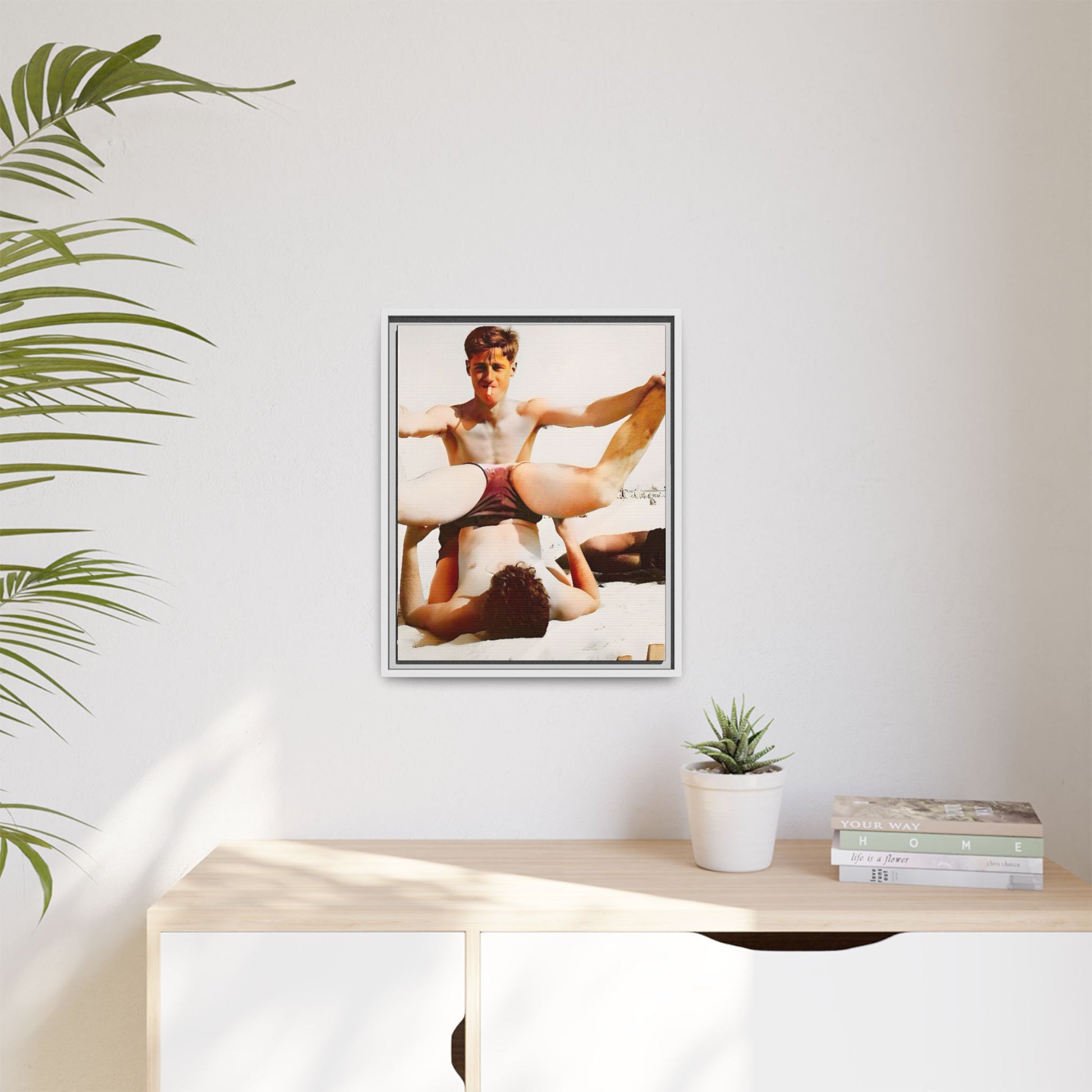 Restored mid-20th century photo of Mitch and Sam at 12th Street Beach, Miami, sharing a playful moment of love and joy, framed as wall décor.