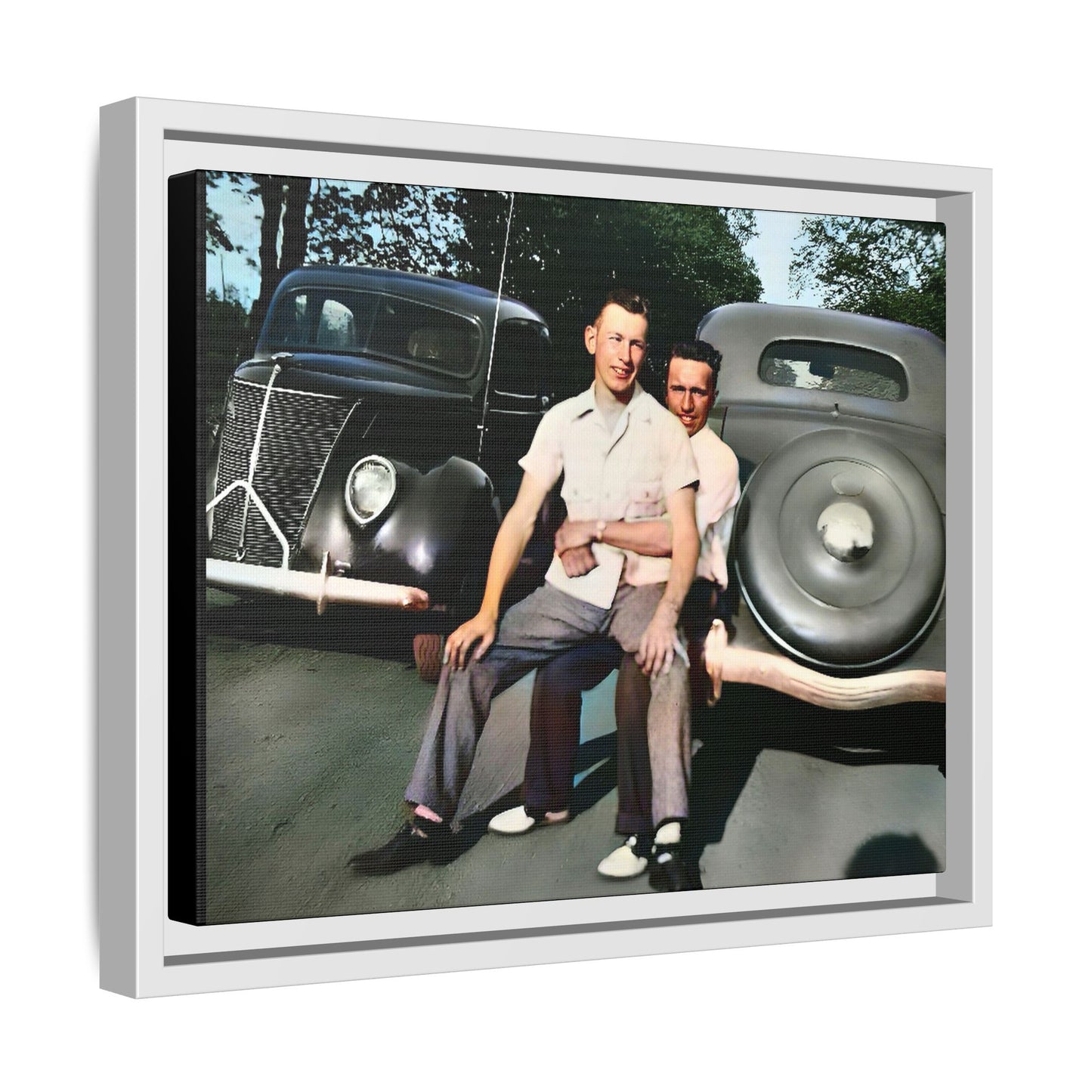 Restored vintage photograph of Andrew and Eugene seated on a classic car bumper in 1930s Lincoln, Nebraska. Framed matte canvas print celebrating LGBTQ+ history, love, and timeless companionship. Gay Couple