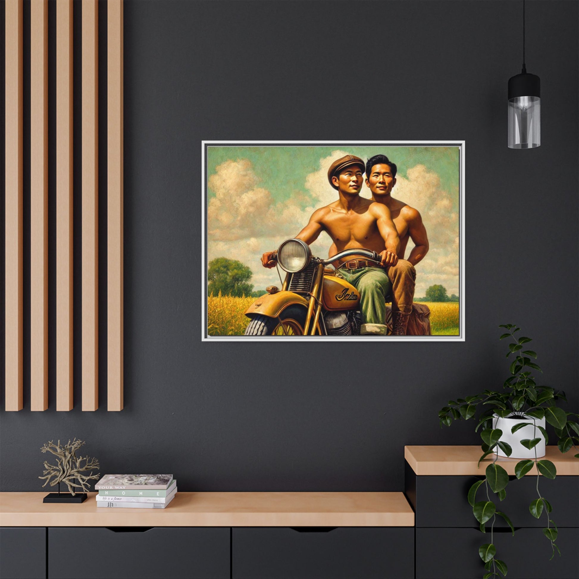 Framed artwork of an Asian-American gay couple riding a vintage yellow motorcycle through Iowa's serene countryside, celebrating love and unity.