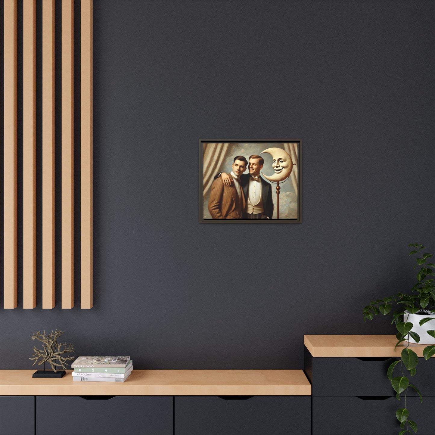 Framed matte canvas artwork of two men in vintage tuxedos standing beside a crescent moon prop. This piece reclaims LGBTQ+ representation lost to bias and honors everyday moments of affection and connection once absent from historical archives.