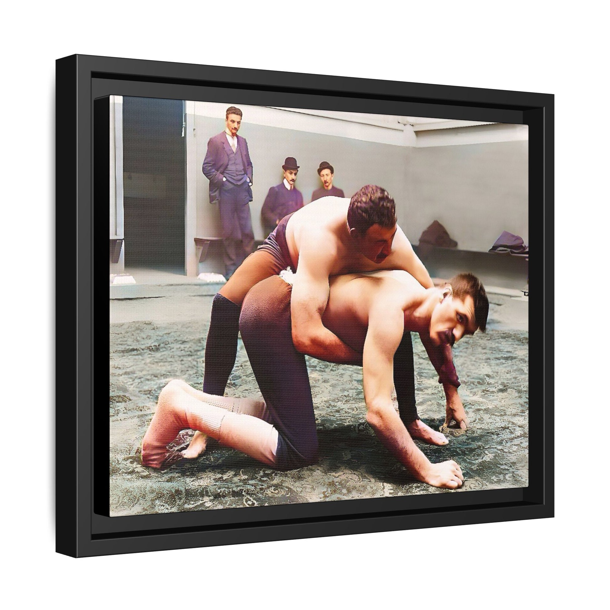 A framed vintage wrestling photograph on matte canvas featuring a Victorian-era match at Love’s Wrestling Club in Plumstead, UK, capturing strength and camaraderie.