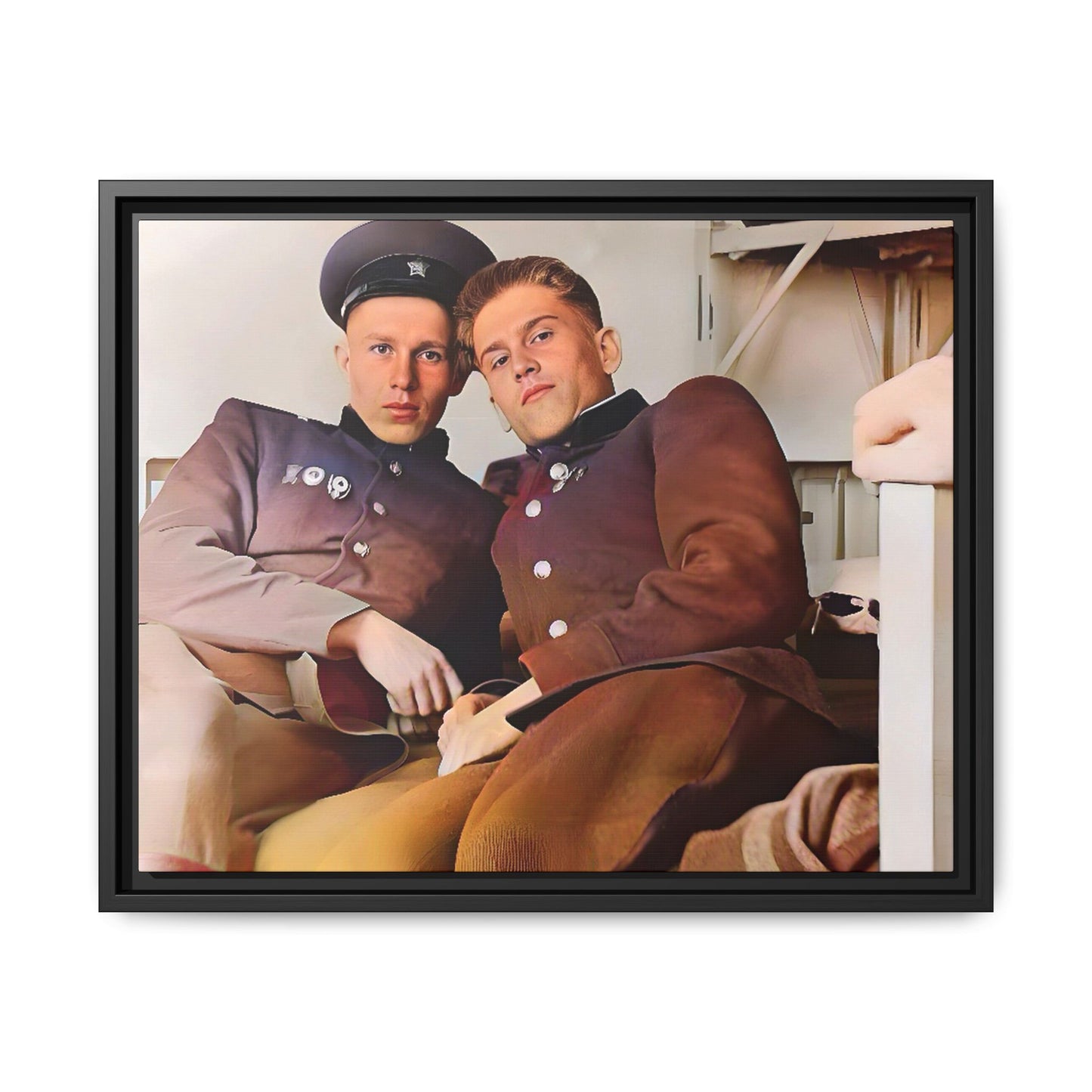 A restored vintage photograph of two Russian soldiers in uniform, seated together in their quarters in Volgograd, Russia. Their relaxed postures and warm expressions capture a moment of camaraderie, resilience, and military history. A powerful tribute to LGBTQ+ representation in the armed forces. Gay Couple Винтажное фото  гей-пара