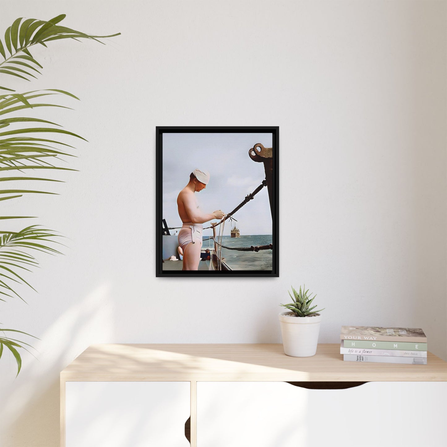 A framed vintage naval portrait on matte canvas featuring a sailor aboard the USS Iowa, honoring maritime history and dedication.
