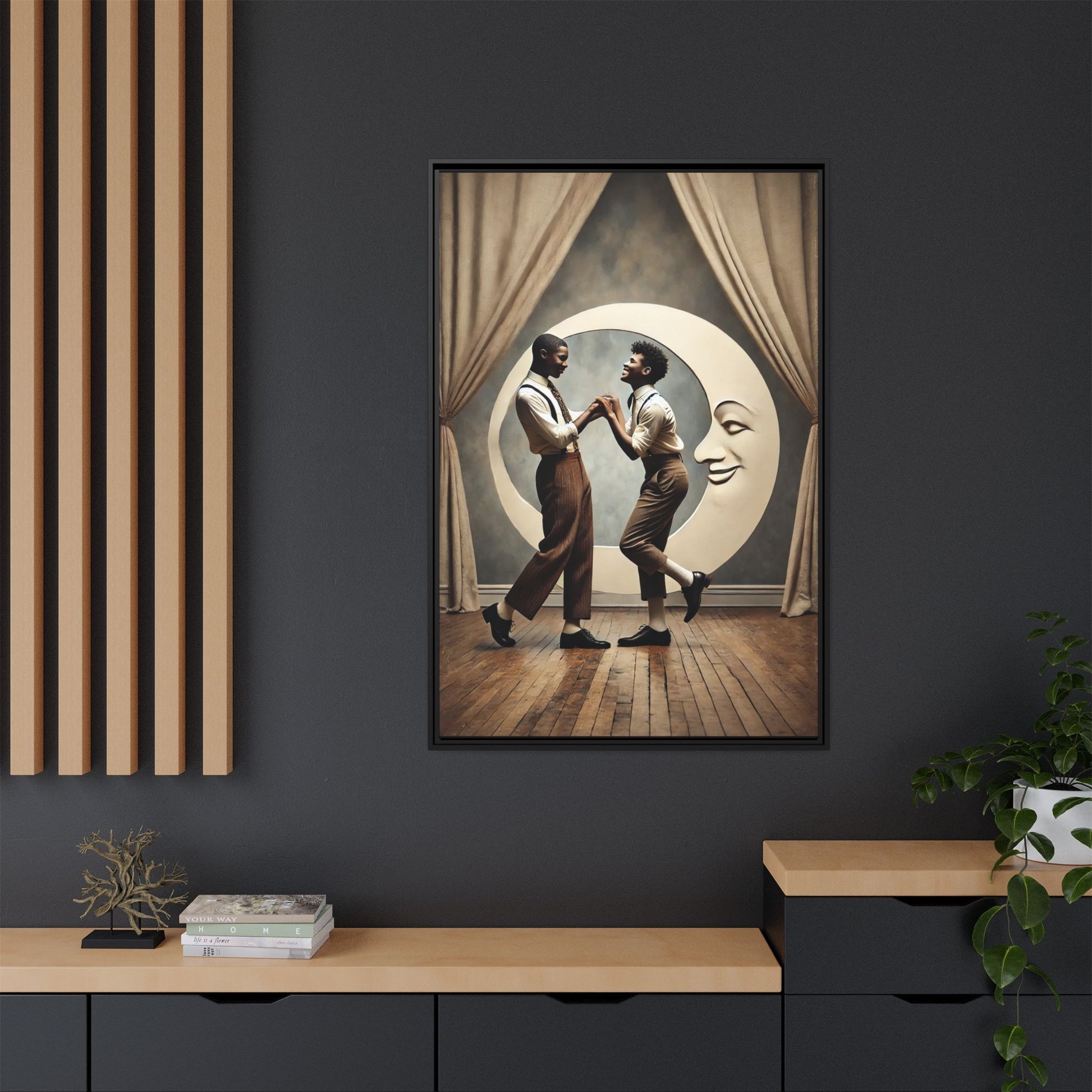 Two joyful young Black men dressed in 1920s fashion dancing in front of a crescent moon prop with a smiling face. This artwork reclaims erased queer love, offering a whimsical and powerful celebration of Black LGBTQ+ youth and history.