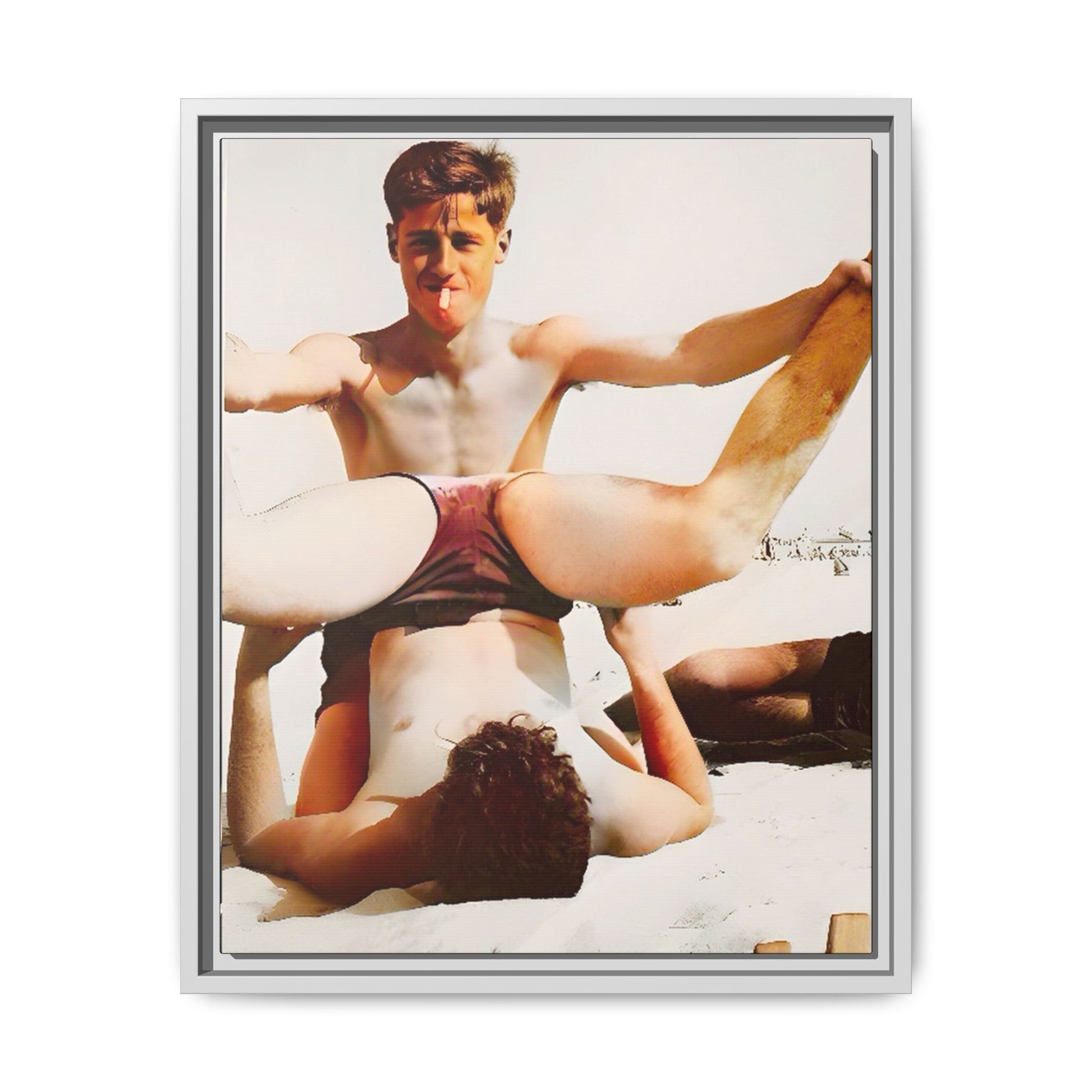Restored mid-20th century photo of Mitch and Sam at 12th Street Beach, Miami, sharing a playful moment of love and joy, framed as wall décor.