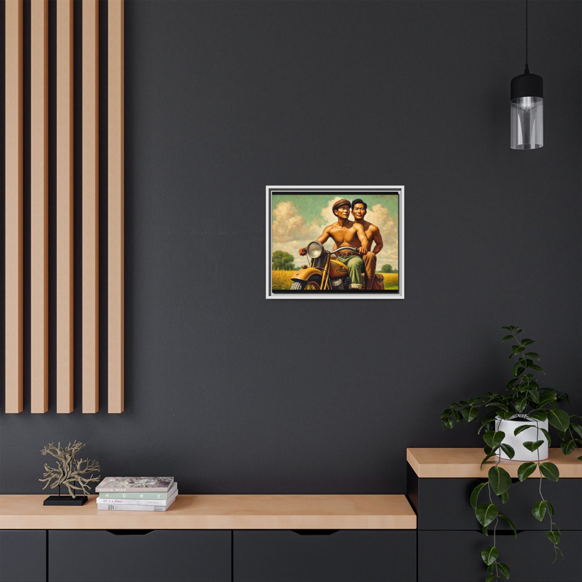 Framed artwork of an Asian-American gay couple riding a vintage yellow motorcycle through Iowa's serene countryside, celebrating love and unity.
