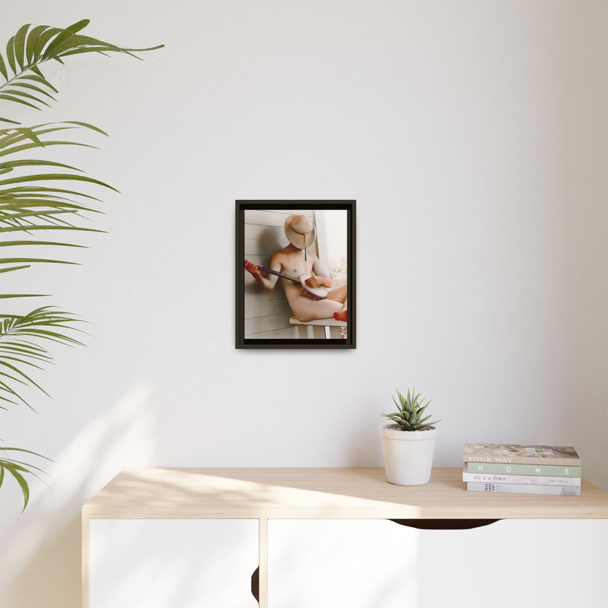 A framed vintage portrait on matte canvas featuring Glenn in Alum Creek, West Virginia, capturing the Appalachian spirit with a banjo in hand.