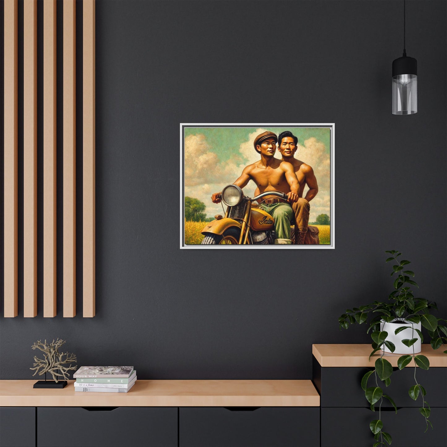 Framed artwork of an Asian-American gay couple riding a vintage yellow motorcycle through Iowa's serene countryside, celebrating love and unity.