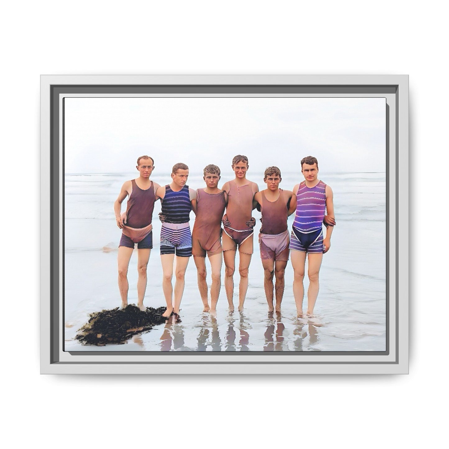 A framed vintage beach portrait on matte canvas featuring a joyful group at Herring Cove Beach, Provincetown, capturing timeless summer camaraderie.