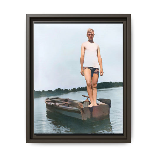 A framed vintage lake portrait on matte canvas featuring George standing on a rowboat at Creve Coeur Lake, Missouri, capturing timeless outdoor nostalgia.