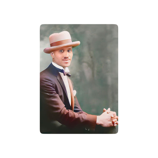 Vintage photo of an African American gentleman in a sharp suit and fedora, capturing elegance, style, and LGBTQ+ history.