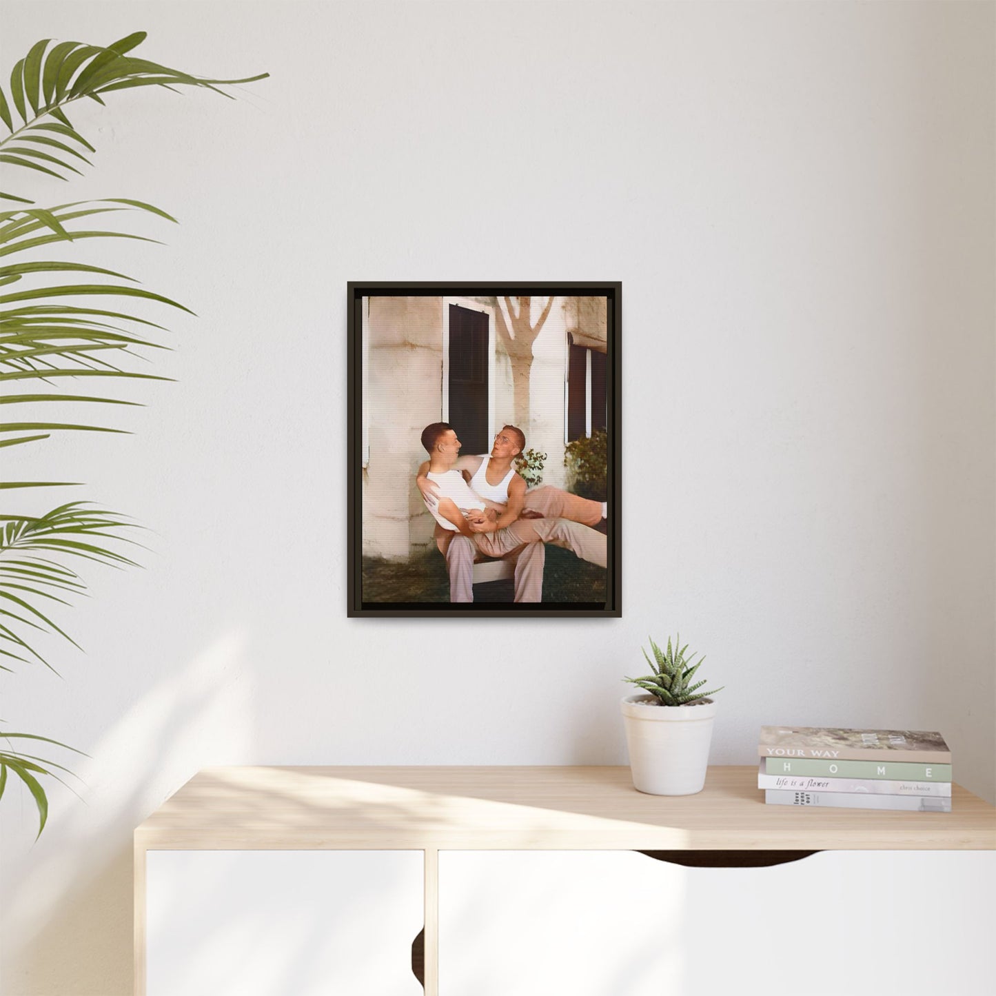 A vintage photograph of Donald and Joseph, two men embracing with joy in 1930s New Orleans. Captured in warm sunlight against a rustic Louisiana home, this intimate portrait celebrates LGBTQ+ history, love, and the beauty of unspoken connection. Gay Couple