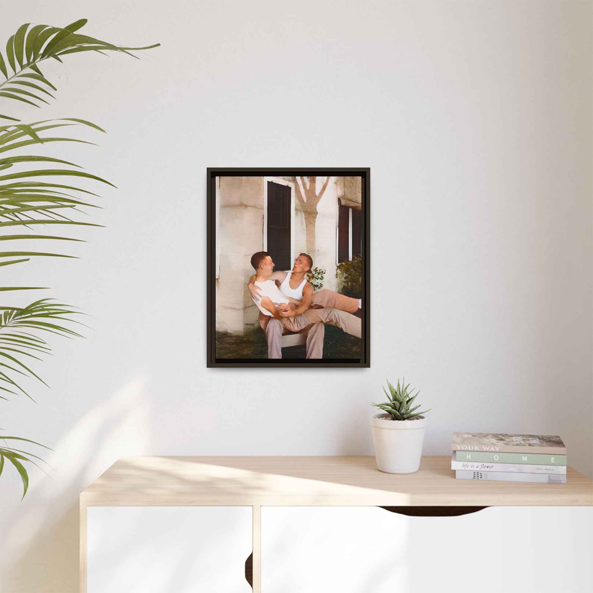 A vintage photograph of Donald and Joseph, two men embracing with joy in 1930s New Orleans. Captured in warm sunlight against a rustic Louisiana home, this intimate portrait celebrates LGBTQ+ history, love, and the beauty of unspoken connection. Gay Couple
