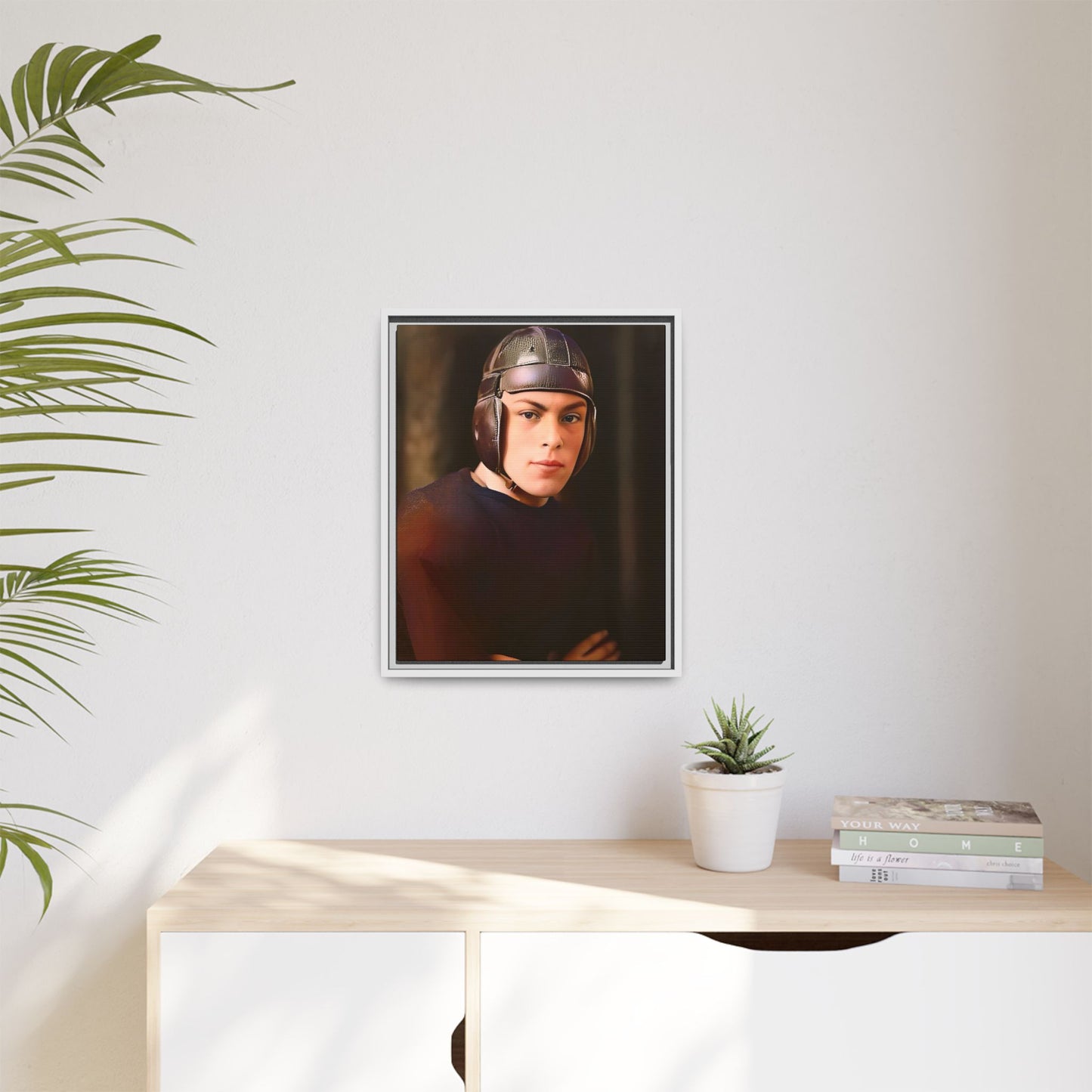 A vintage portrait of Andrew, a football player from Lincoln, Nebraska, in a classic leather helmet. This framed matte canvas print captures the grit and determination of early 20th-century sports, perfect for football fans and vintage art collectors.