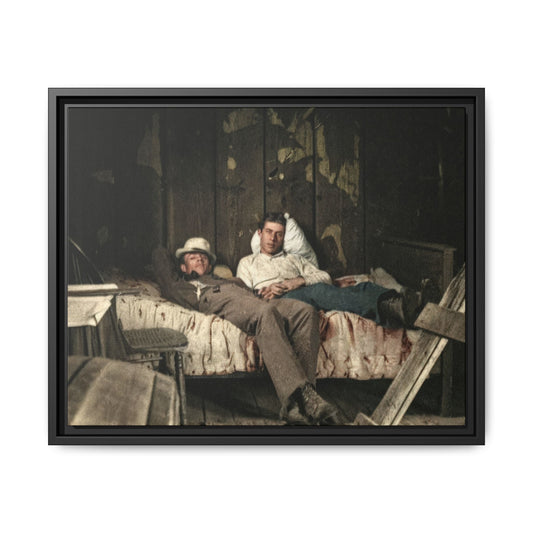 Historic photograph of two figures reclining on bed in wooden interior