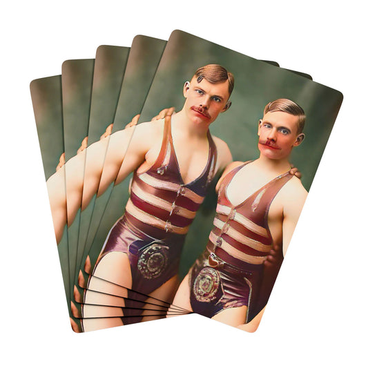 Vintage photo of two muscular men in striped wrestling singlets, standing closely, symbolizing strength, camaraderie, and LGBTQ+ history.
