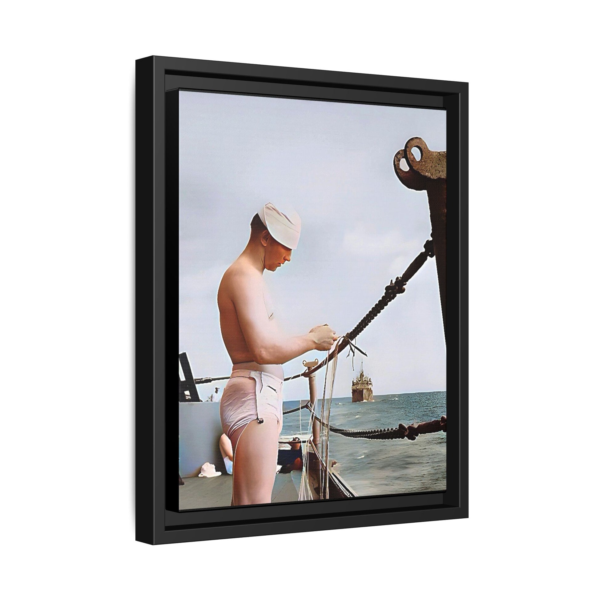 A framed vintage naval portrait on matte canvas featuring a sailor aboard the USS Iowa, honoring maritime history and dedication.