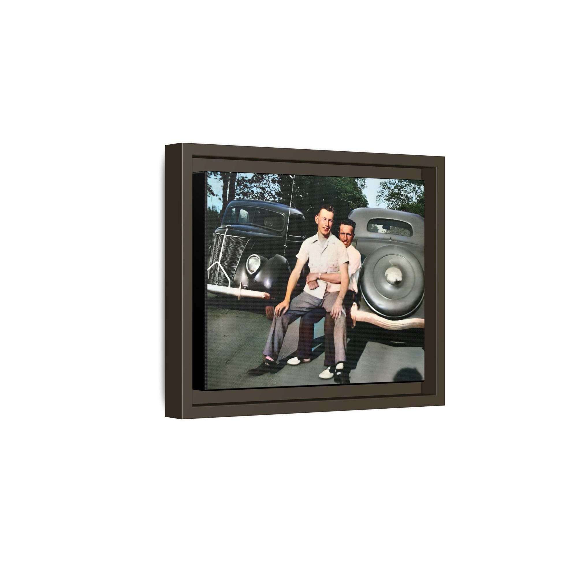 Restored vintage photograph of Andrew and Eugene seated on a classic car bumper in 1930s Lincoln, Nebraska. Framed matte canvas print celebrating LGBTQ+ history, love, and timeless companionship. Gay Couple