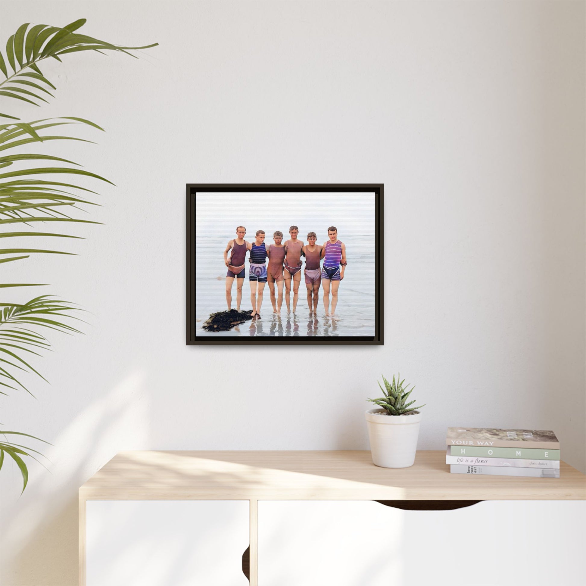A framed vintage beach portrait on matte canvas featuring a joyful group at Herring Cove Beach, Provincetown, capturing timeless summer camaraderie.