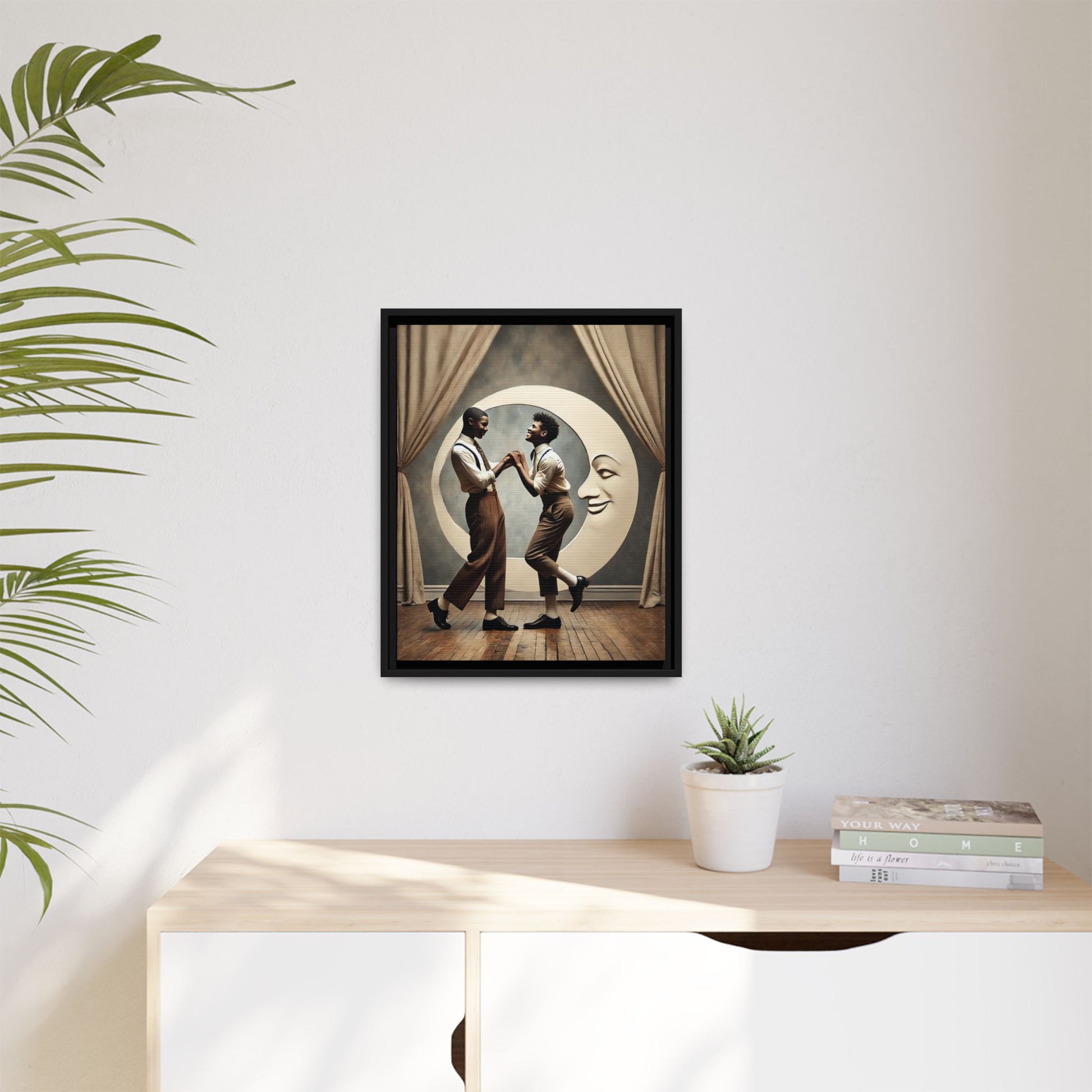 Two joyful young Black men dressed in 1920s fashion dancing in front of a crescent moon prop with a smiling face. This artwork reclaims erased queer love, offering a whimsical and powerful celebration of Black LGBTQ+ youth and history.
