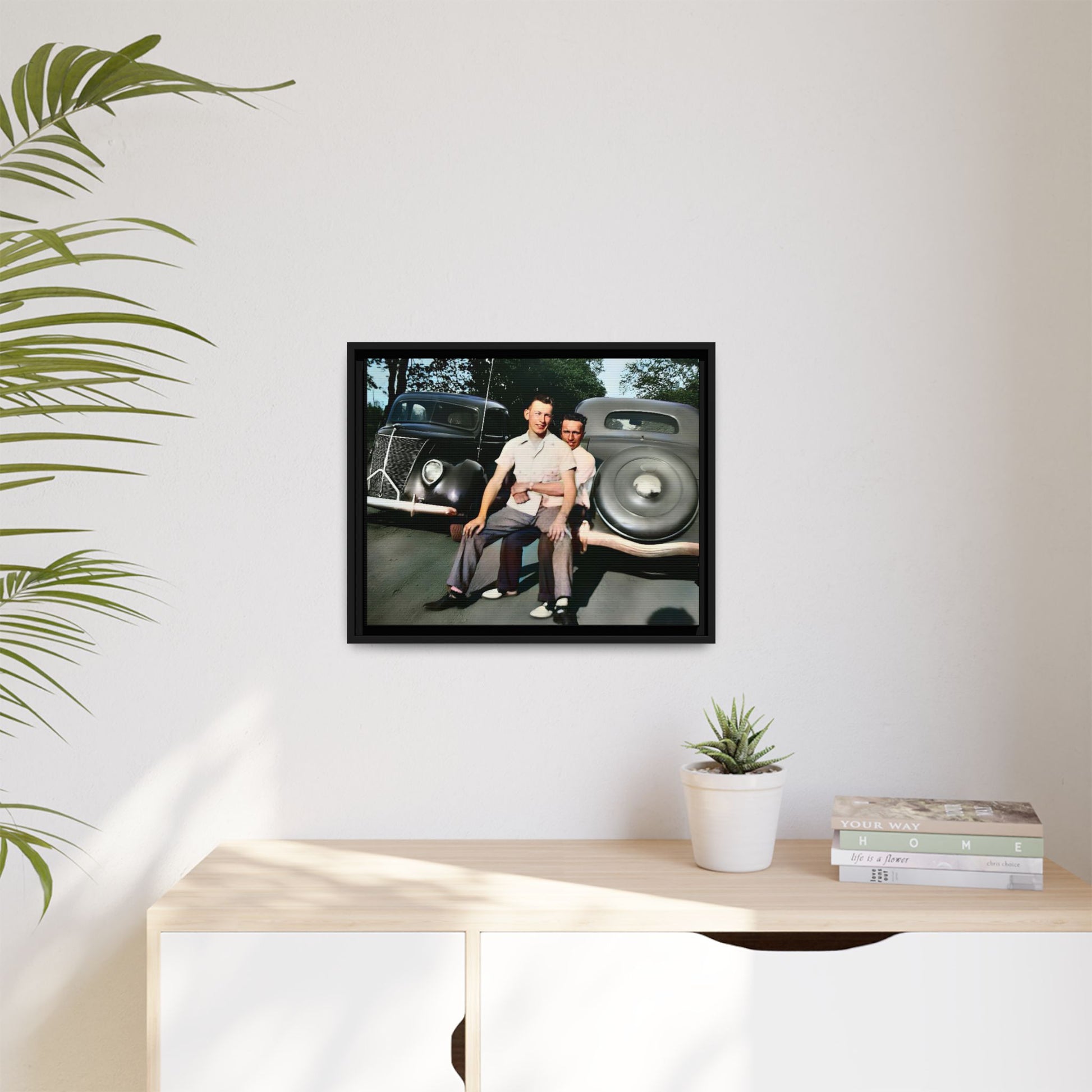 Restored vintage photograph of Andrew and Eugene seated on a classic car bumper in 1930s Lincoln, Nebraska. Framed matte canvas print celebrating LGBTQ+ history, love, and timeless companionship. Gay Couple