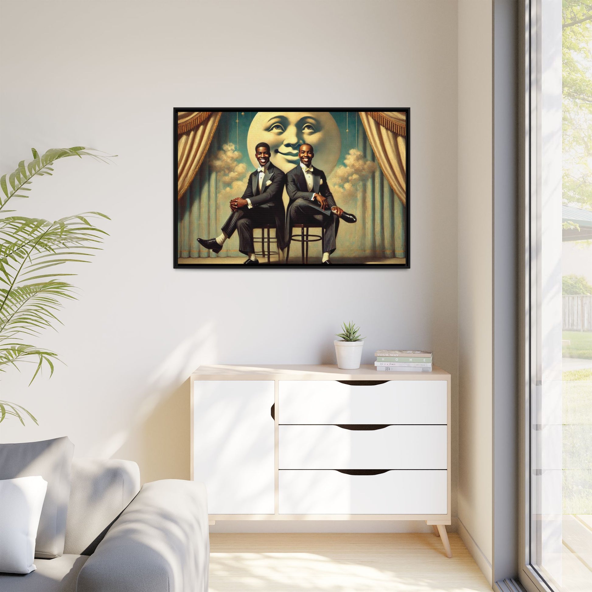 Framed vintage-style portrait of two Black men in tuxedos seated under a smiling crescent moon prop with golden curtains and cloud backdrop. This restored matte canvas honors lost LGBTQ history and reclaims early 20th-century queer representation with pride.