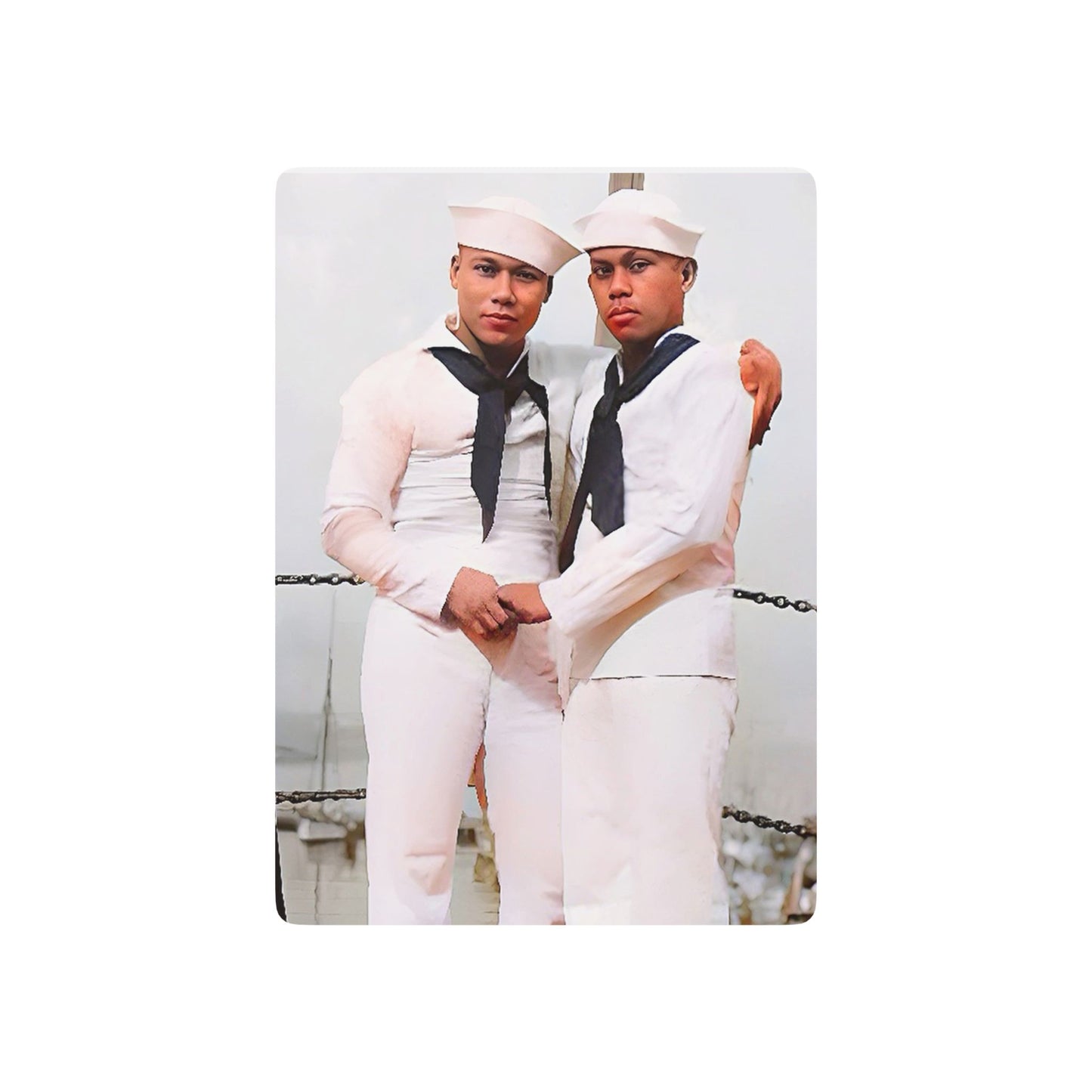 Vintage WWII photo of two sailors in white Navy uniforms embracing aboard a ship, symbolizing Queer love and resilience.