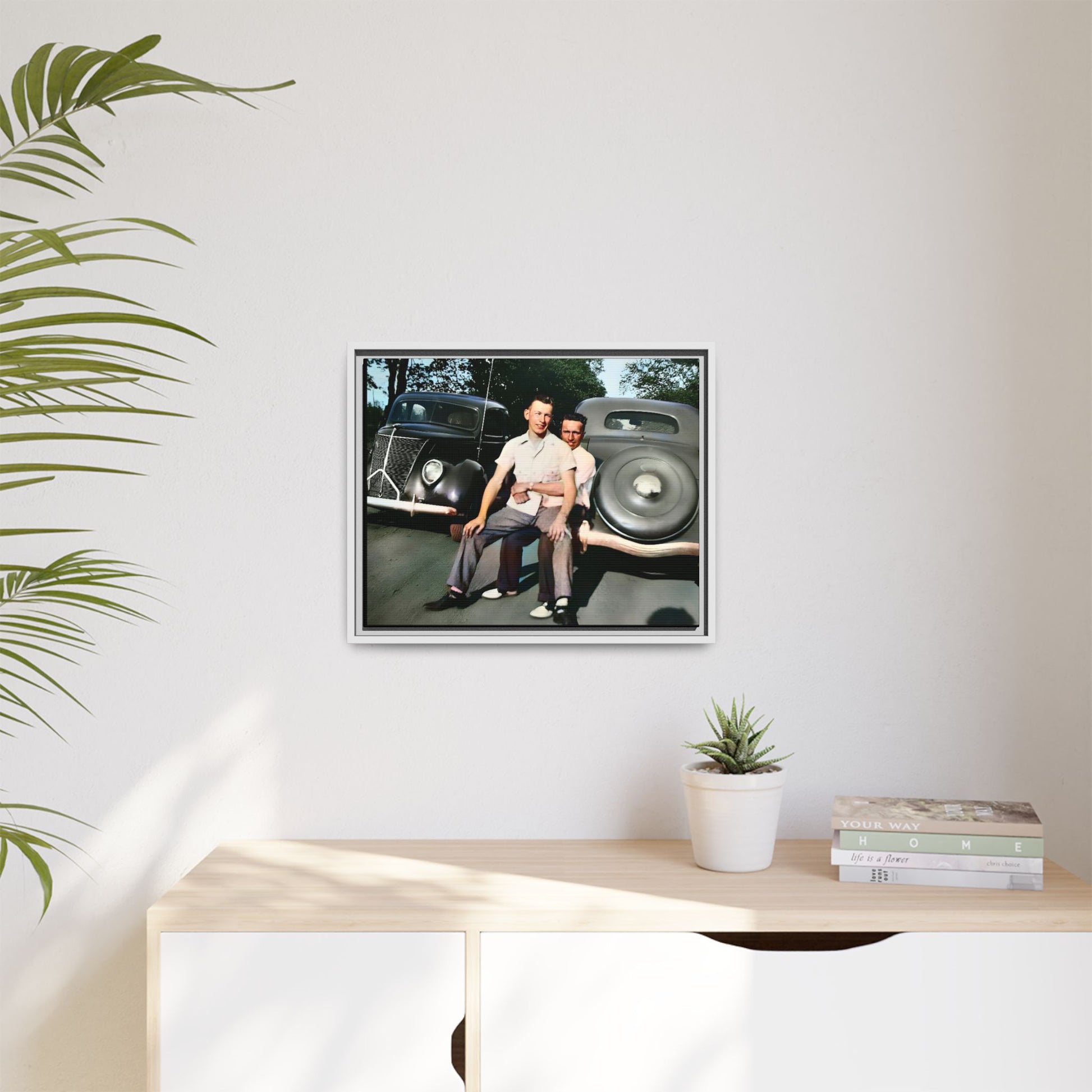 Restored vintage photograph of Andrew and Eugene seated on a classic car bumper in 1930s Lincoln, Nebraska. Framed matte canvas print celebrating LGBTQ+ history, love, and timeless companionship. Gay Couple