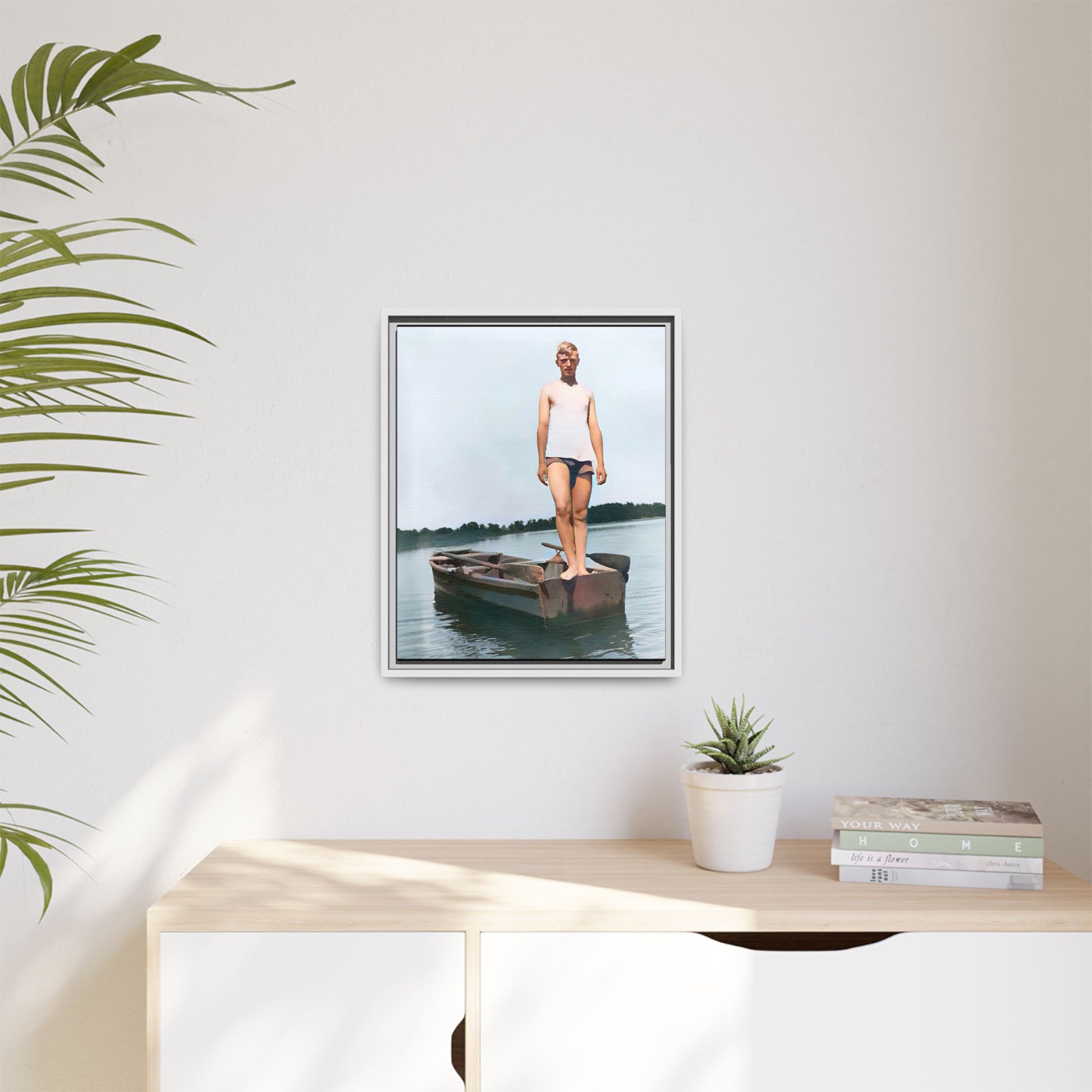 A framed vintage lake portrait on matte canvas featuring George standing on a rowboat at Creve Coeur Lake, Missouri, capturing timeless outdoor nostalgia.