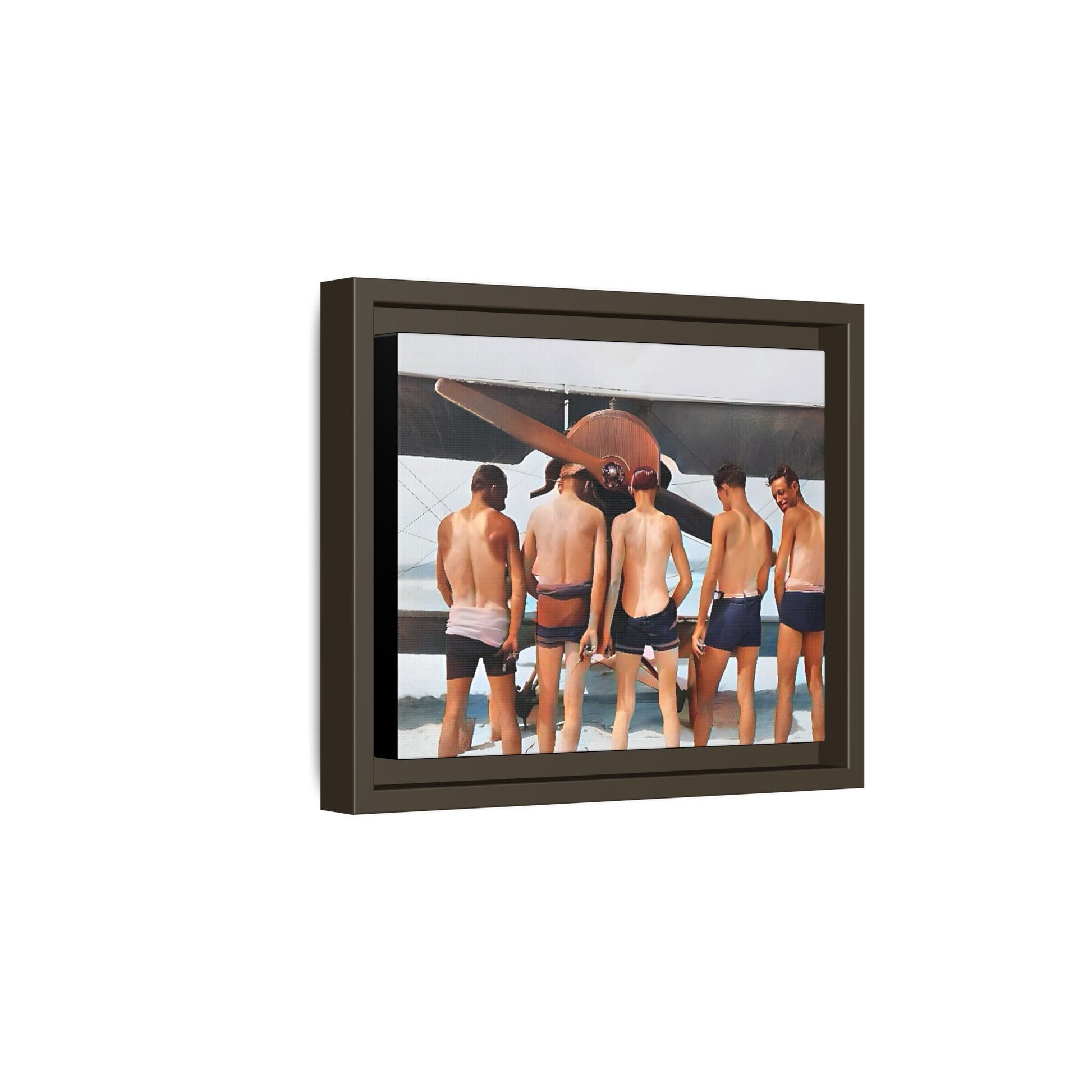 A beautifully restored vintage photograph of five men standing on a sunlit Key West beach with a vintage aircraft in the background. This nostalgic canvas print captures coastal adventure, camaraderie, and the free spirit of aviation history. Men urinating