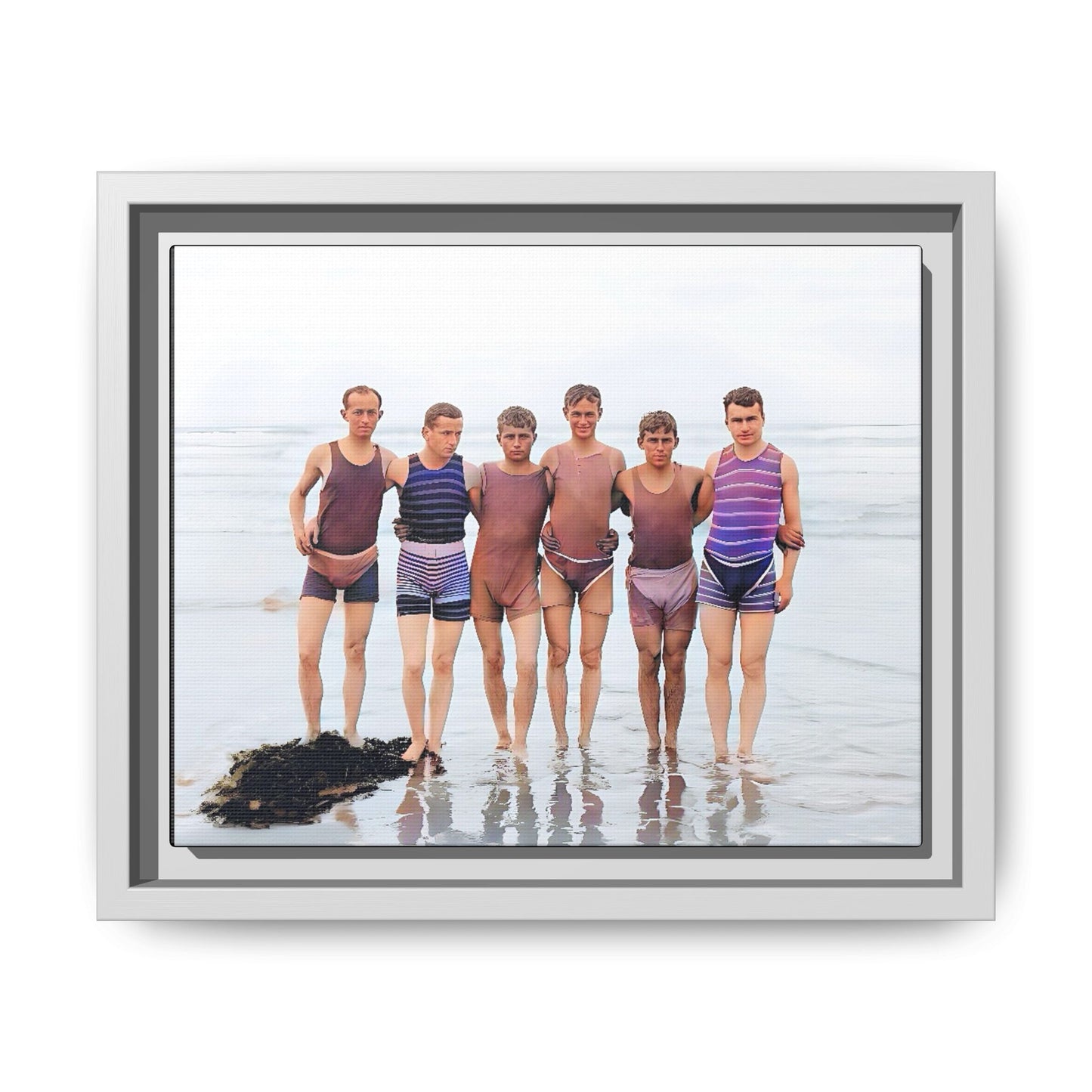 A framed vintage beach portrait on matte canvas featuring a joyful group at Herring Cove Beach, Provincetown, capturing timeless summer camaraderie.
