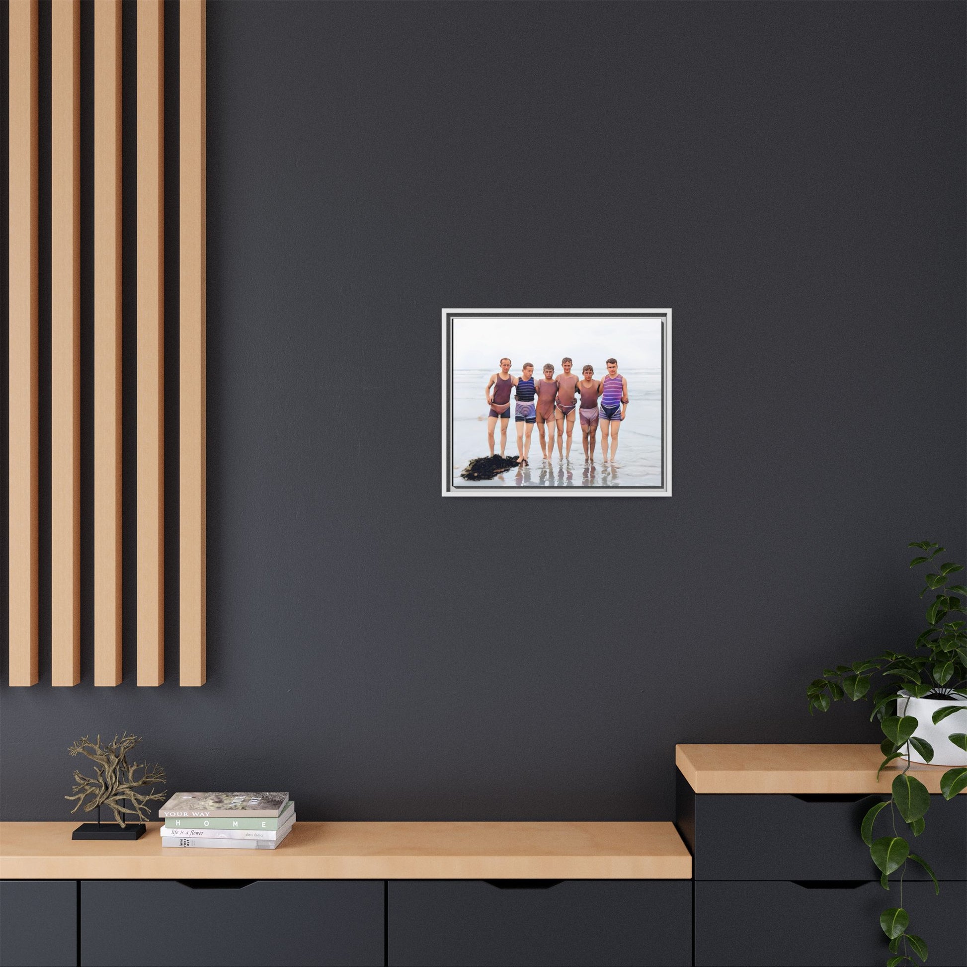 A framed vintage beach portrait on matte canvas featuring a joyful group at Herring Cove Beach, Provincetown, capturing timeless summer camaraderie.