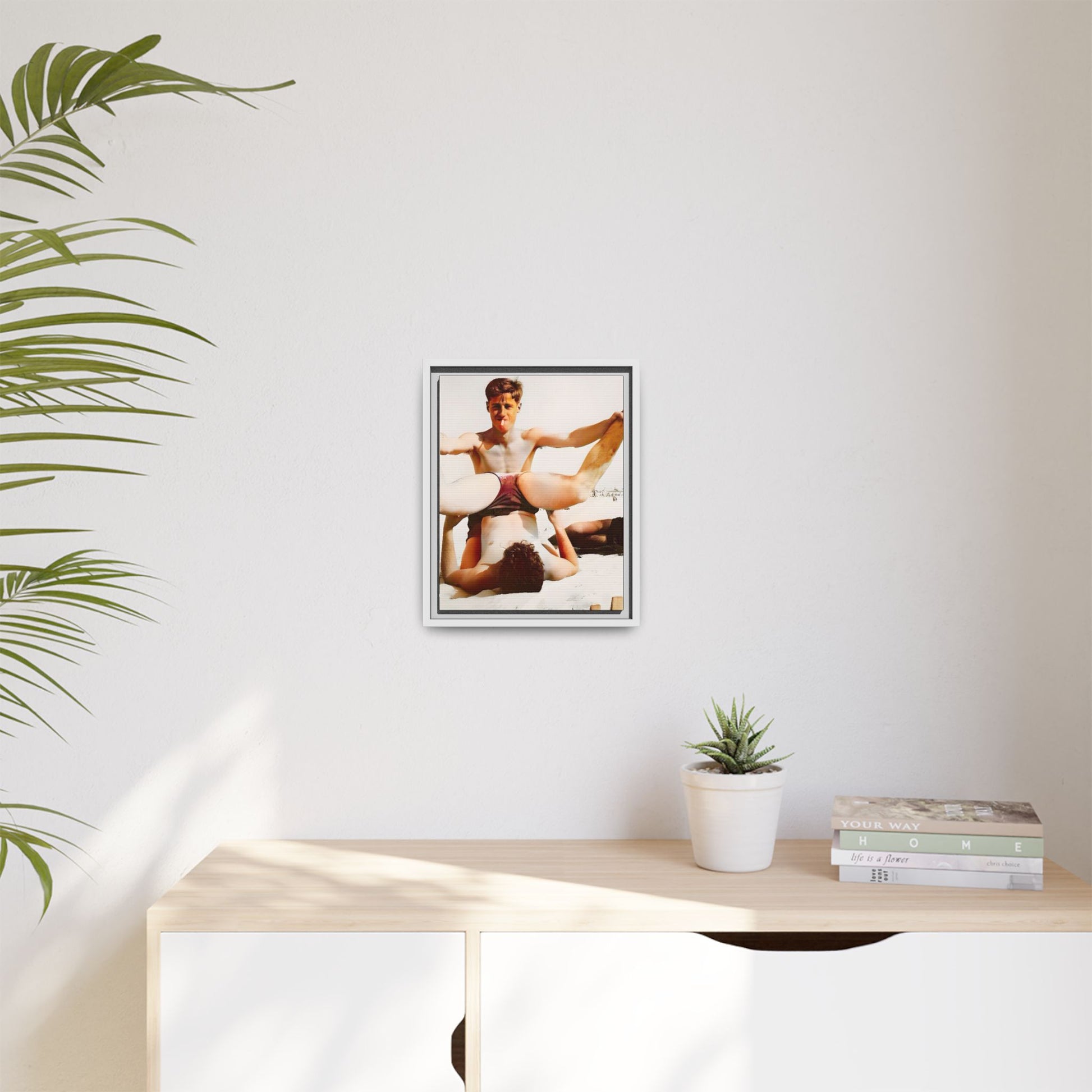 Restored mid-20th century photo of Mitch and Sam at 12th Street Beach, Miami, sharing a playful moment of love and joy, framed as wall décor.