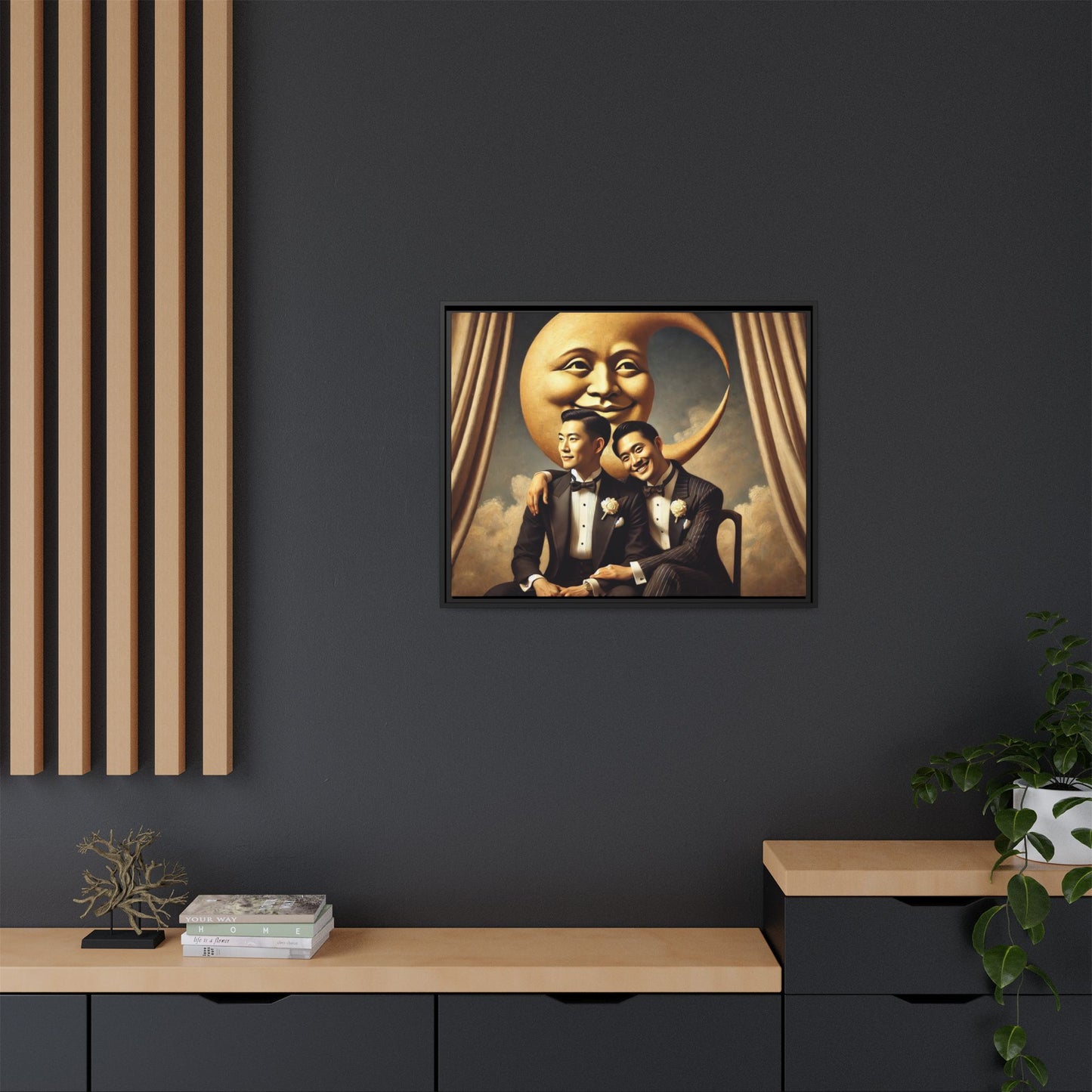 Vintage-inspired artwork of a romantic gay Asian couple in tuxedos sitting affectionately beneath a smiling crescent moon prop, surrounded by vintage stage curtains and dreamy clouds. A reclaimed queer narrative from the Man In The Moon series.