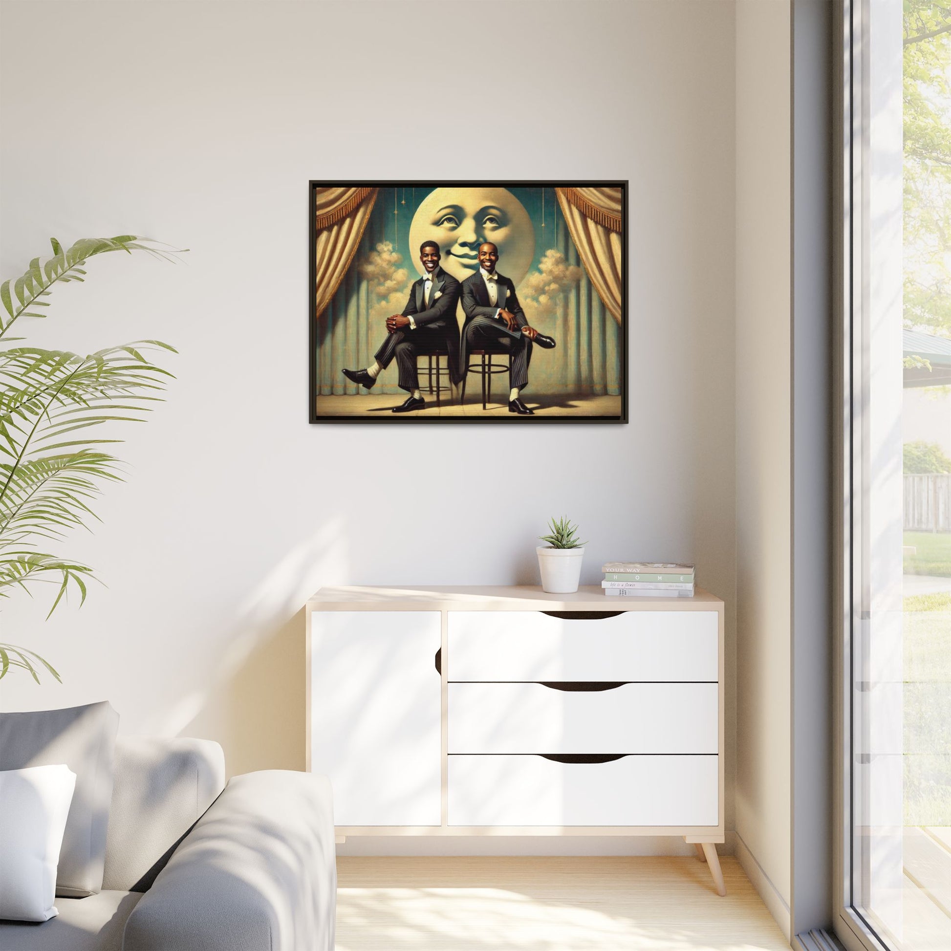Framed vintage-style portrait of two Black men in tuxedos seated under a smiling crescent moon prop with golden curtains and cloud backdrop. This restored matte canvas honors lost LGBTQ history and reclaims early 20th-century queer representation with pride.