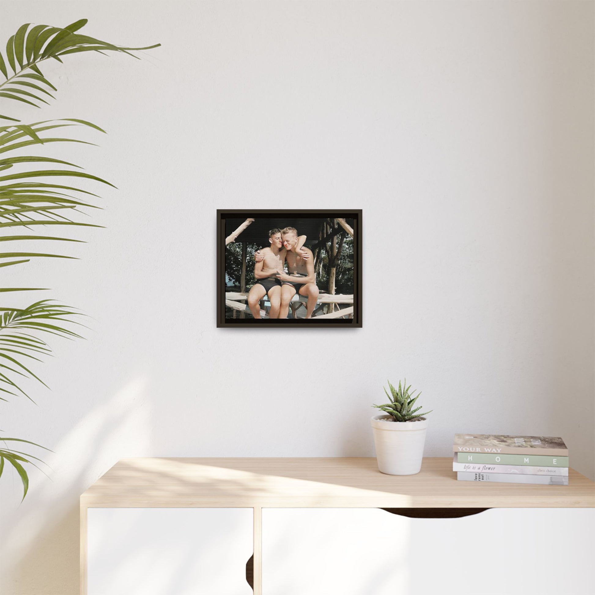 A vintage-inspired framed canvas print featuring Joseph and Billy at Kahena Beach, Hawaii. Their intimate moment under a sunlit pergola captures the warmth of love, freedom, and tropical serenity—perfect for coastal, LGBTQ+, and romantic home decor.