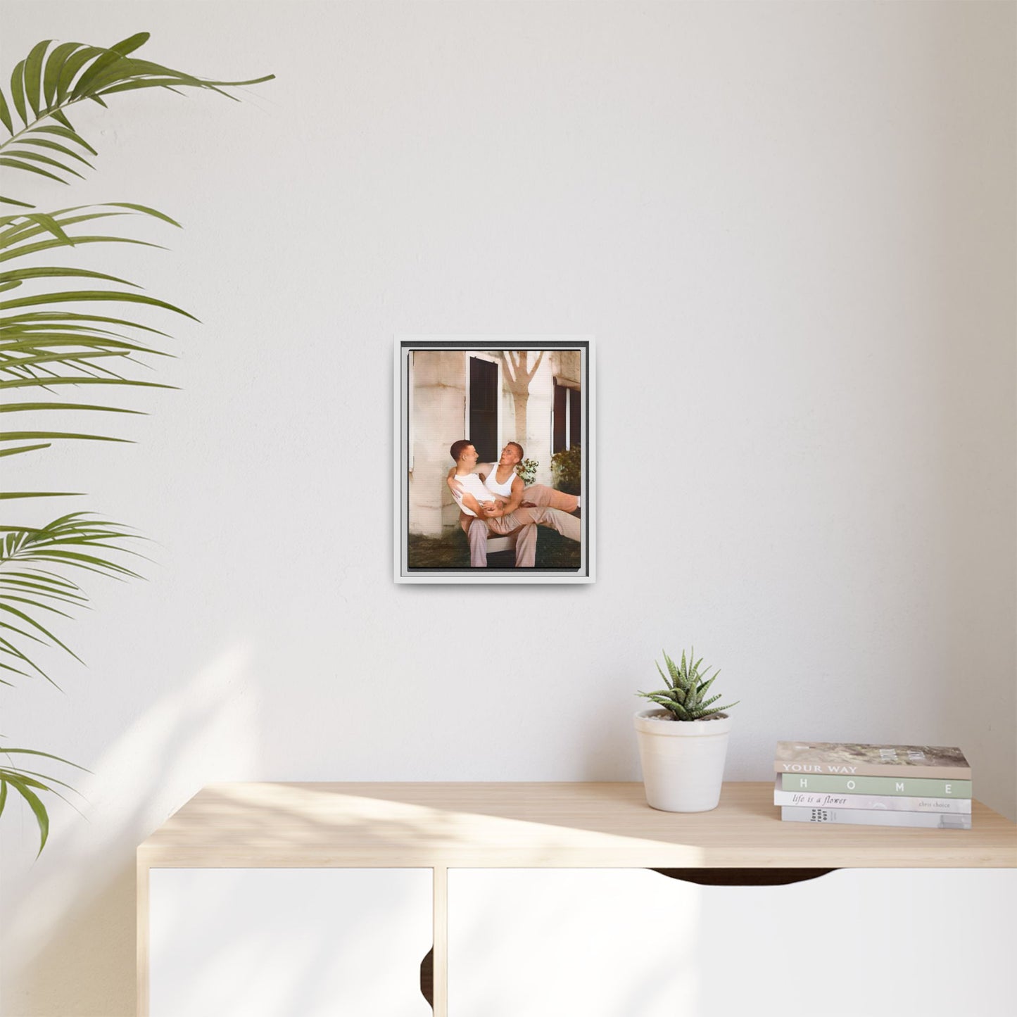 A vintage photograph of Donald and Joseph, two men embracing with joy in 1930s New Orleans. Captured in warm sunlight against a rustic Louisiana home, this intimate portrait celebrates LGBTQ+ history, love, and the beauty of unspoken connection. Gay Couple