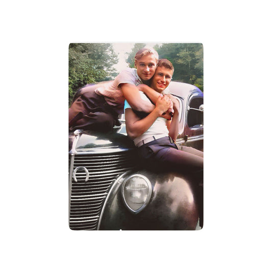 A restored vintage photo of a gay couple embracing on a classic 1930s car, capturing a hidden Queer love story.