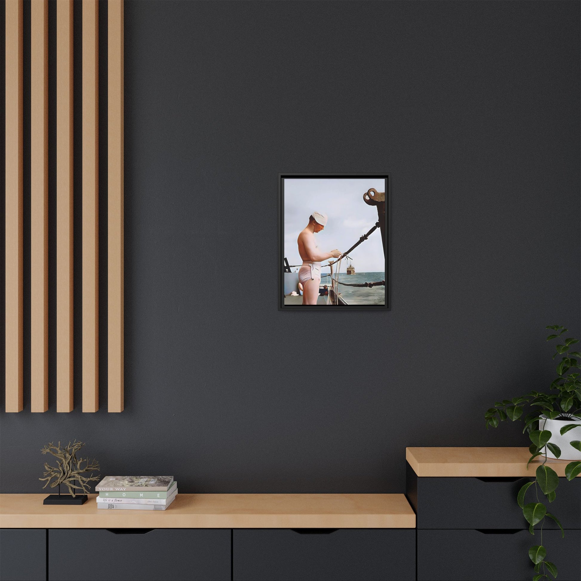 A framed vintage naval portrait on matte canvas featuring a sailor aboard the USS Iowa, honoring maritime history and dedication.
