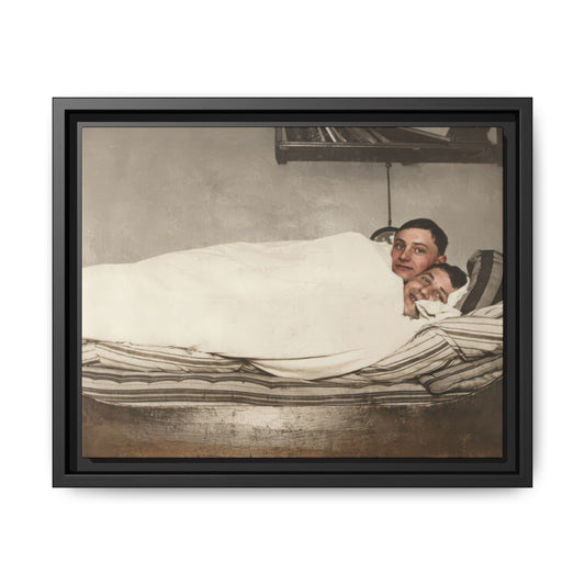 Vintage photograph of two figures reclining in bed under blanket interior scene