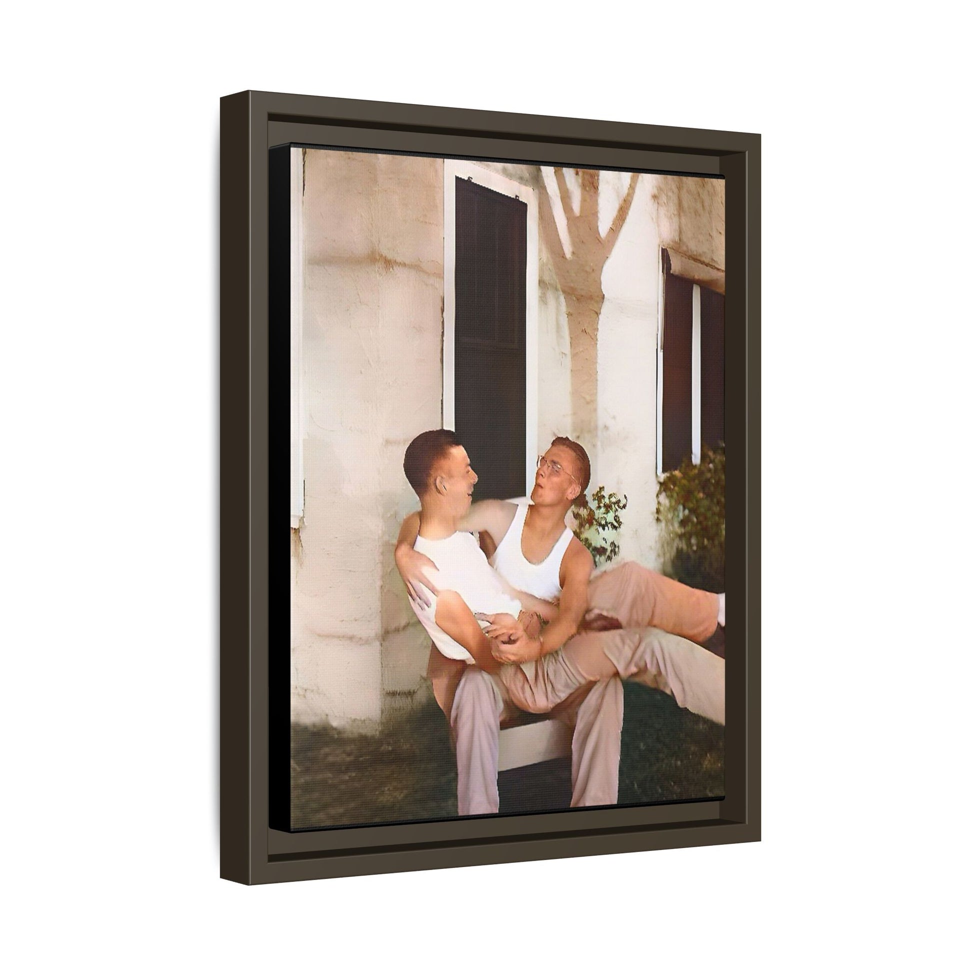 A vintage photograph of Donald and Joseph, two men embracing with joy in 1930s New Orleans. Captured in warm sunlight against a rustic Louisiana home, this intimate portrait celebrates LGBTQ+ history, love, and the beauty of unspoken connection. Gay Couple