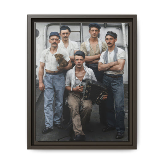 Five men in caps and light shirts pose around an accordion, with a ship’s ladder, porthole, and pipes behind them.