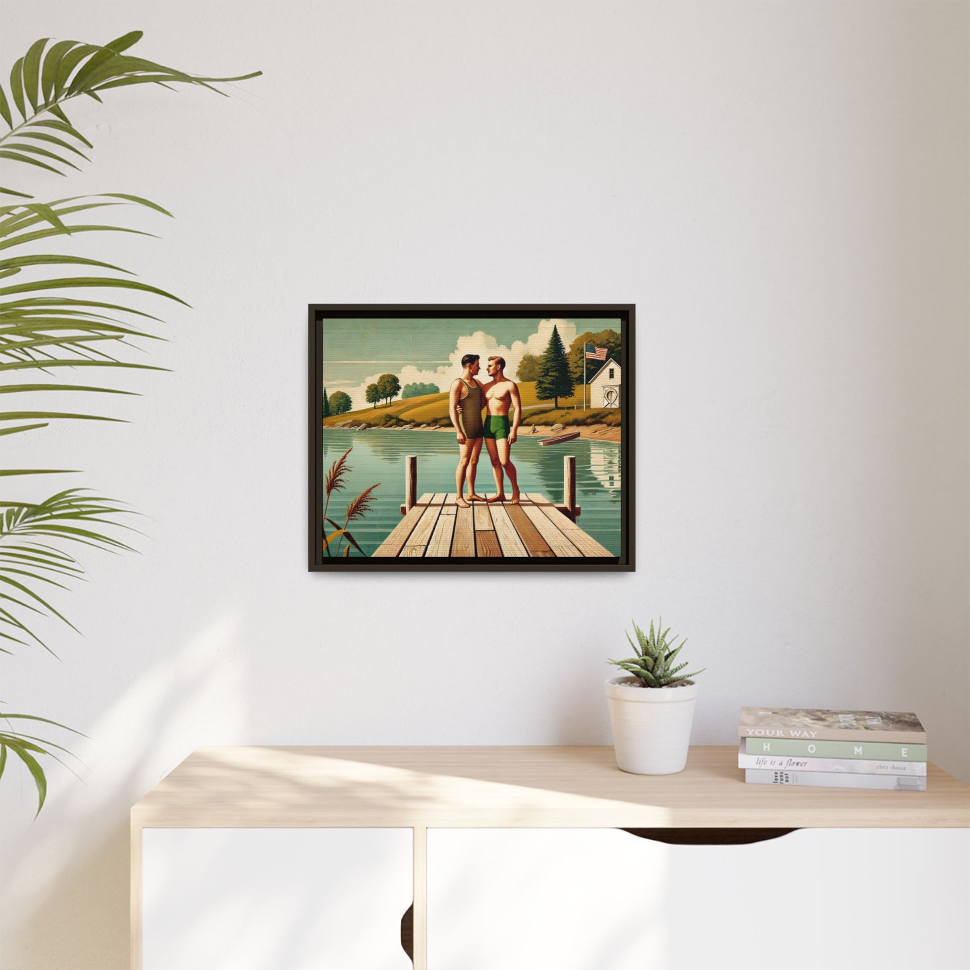 Framed artwork of a gay couple sharing a tender moment on a wooden dock by a peaceful lake, dressed in vintage swimwear. Set against rolling hills and a lakeside cabin, this nostalgic scene honors LGBTQ+ love in a serene Midwestern summer setting.