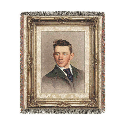 Young man portrait woven cotton blanket with fringe in heirloom-style home décor format