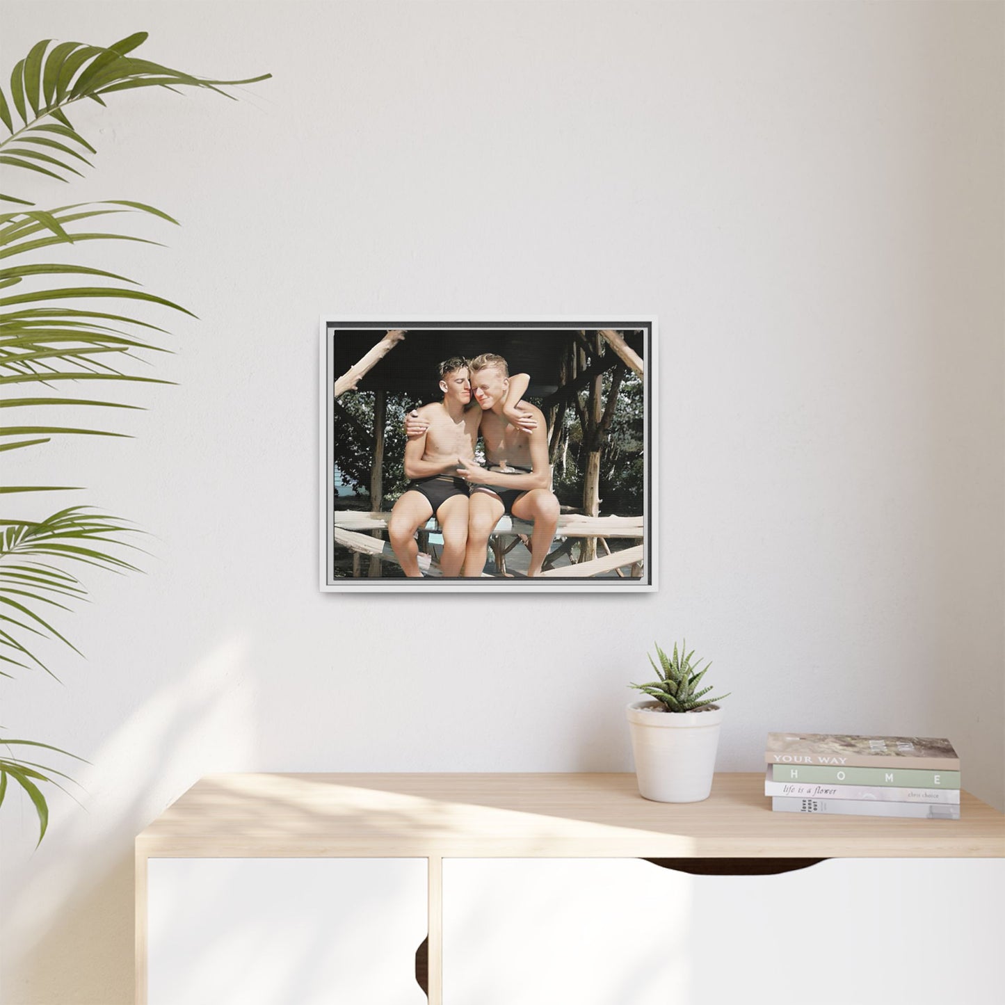 A vintage-inspired framed canvas print featuring Joseph and Billy at Kahena Beach, Hawaii. Their intimate moment under a sunlit pergola captures the warmth of love, freedom, and tropical serenity—perfect for coastal, LGBTQ+, and romantic home decor.