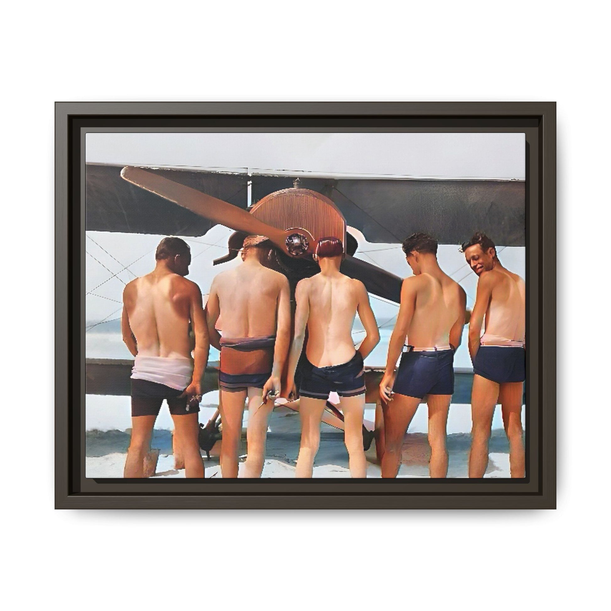 A beautifully restored vintage photograph of five men standing on a sunlit Key West beach with a vintage aircraft in the background. This nostalgic canvas print captures coastal adventure, camaraderie, and the free spirit of aviation history. Men urinating