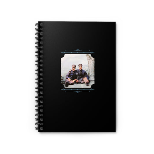 Spiral notebook with a vintage Dutch portrait photo of two men seated in uniform, early 1900s style.
