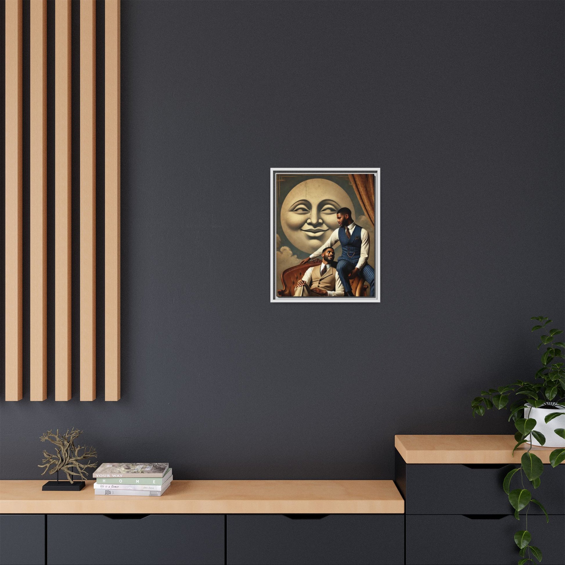An elegant portrait of two Black men in vintage suits, seated affectionately beneath a smiling full moon. This 1920s-inspired artwork reclaims lost LGBTQ history, honoring Black queer love through style, softness, and resilience.