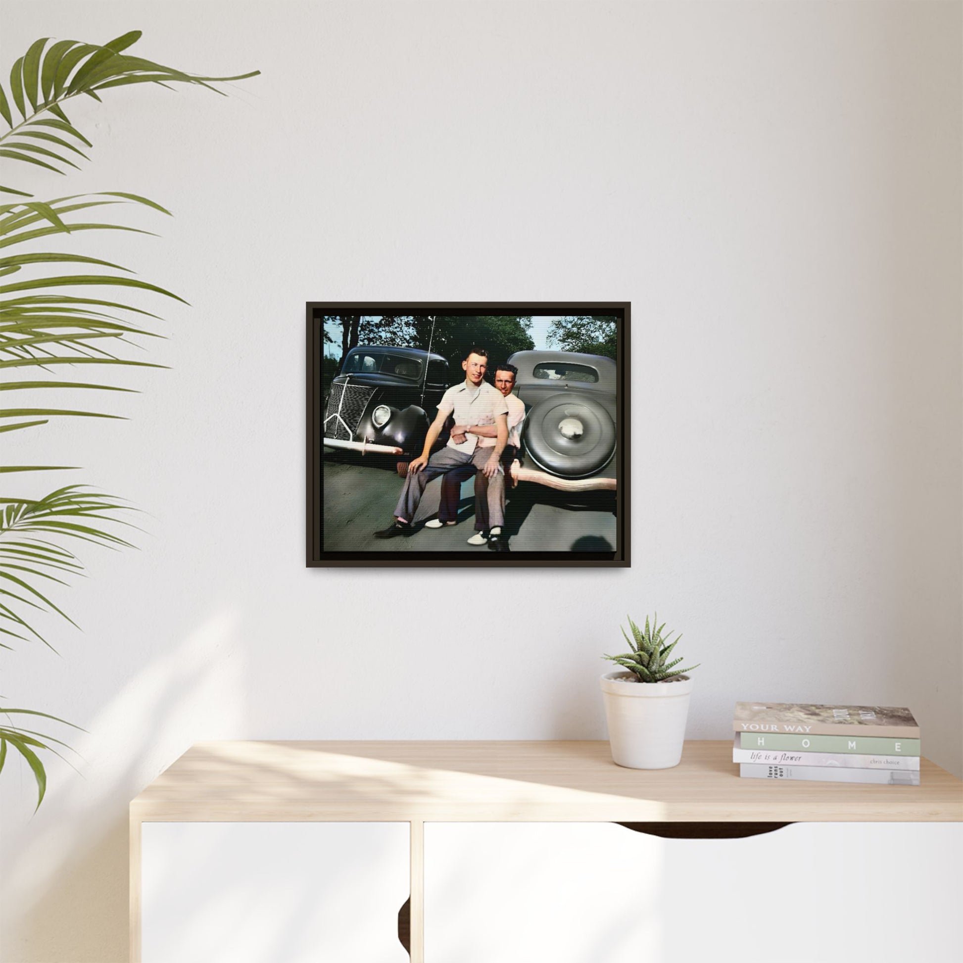 Restored vintage photograph of Andrew and Eugene seated on a classic car bumper in 1930s Lincoln, Nebraska. Framed matte canvas print celebrating LGBTQ+ history, love, and timeless companionship. Gay Couple