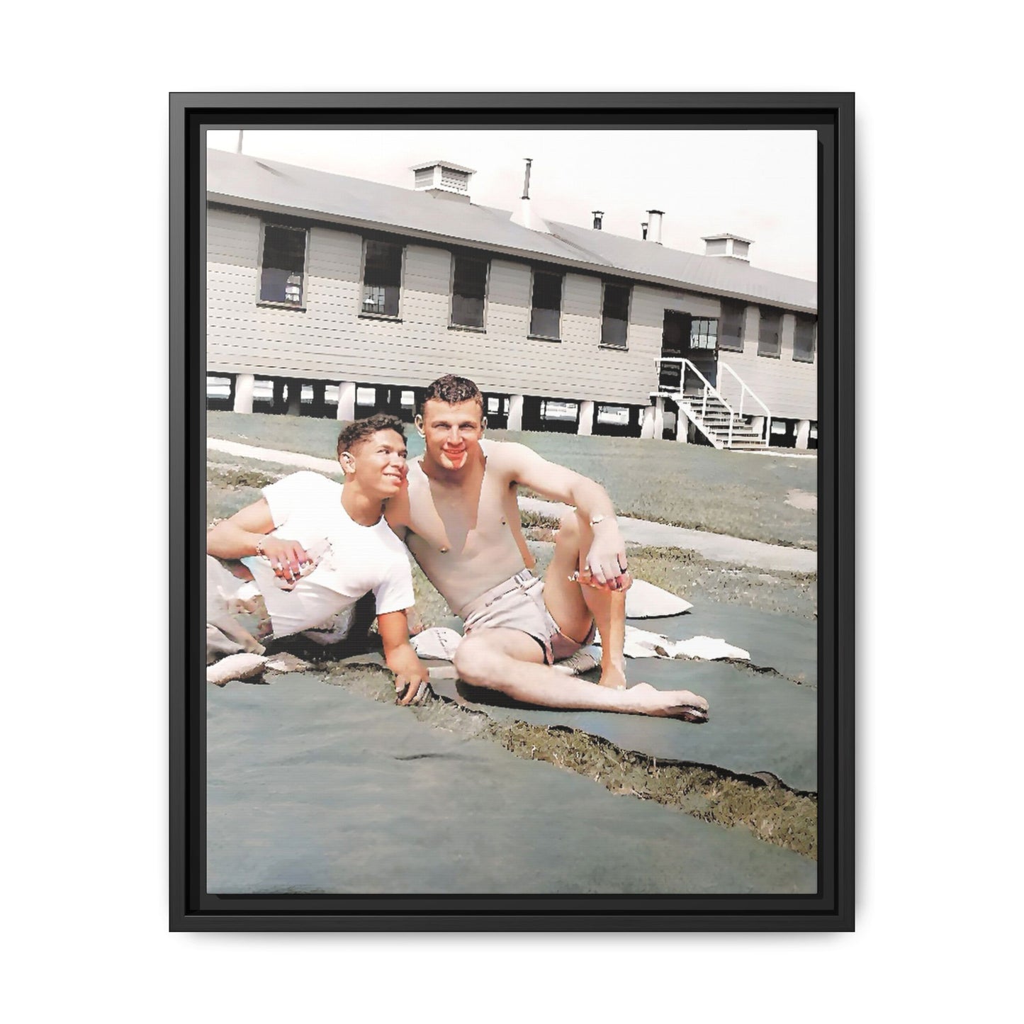 A framed vintage military portrait on matte canvas featuring Wayne and Jerry at Camp Blanding, Florida, capturing a timeless LGBTQ+ connection and companionship.
Gay Couple